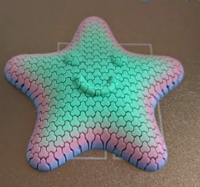 Estrela Fidget Aura Tech | Toque Terapêutico e Cores Vibrantes